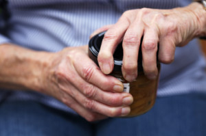 Rheumatoid Arthritis - Crippled Hands Opening Jar